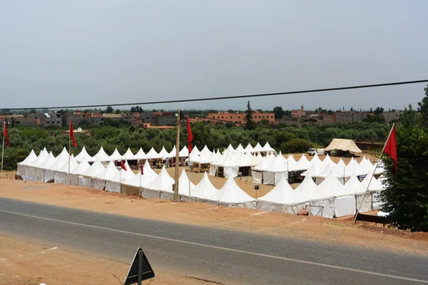 A festive scene showing traditional Moroccan cultural celebrations during one of Morocco’s popular festivals.